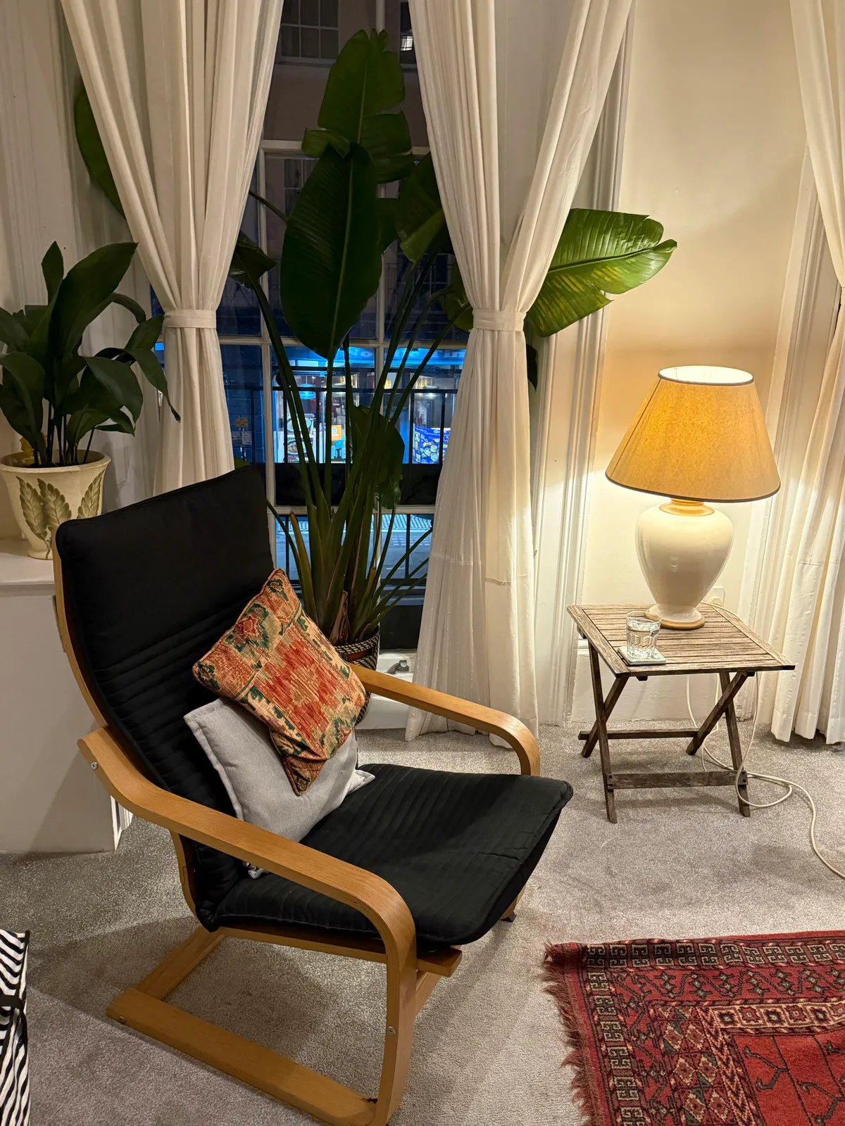 Armchair and reading lamp in the Be Well Therapy counselling room in Greenwich, London